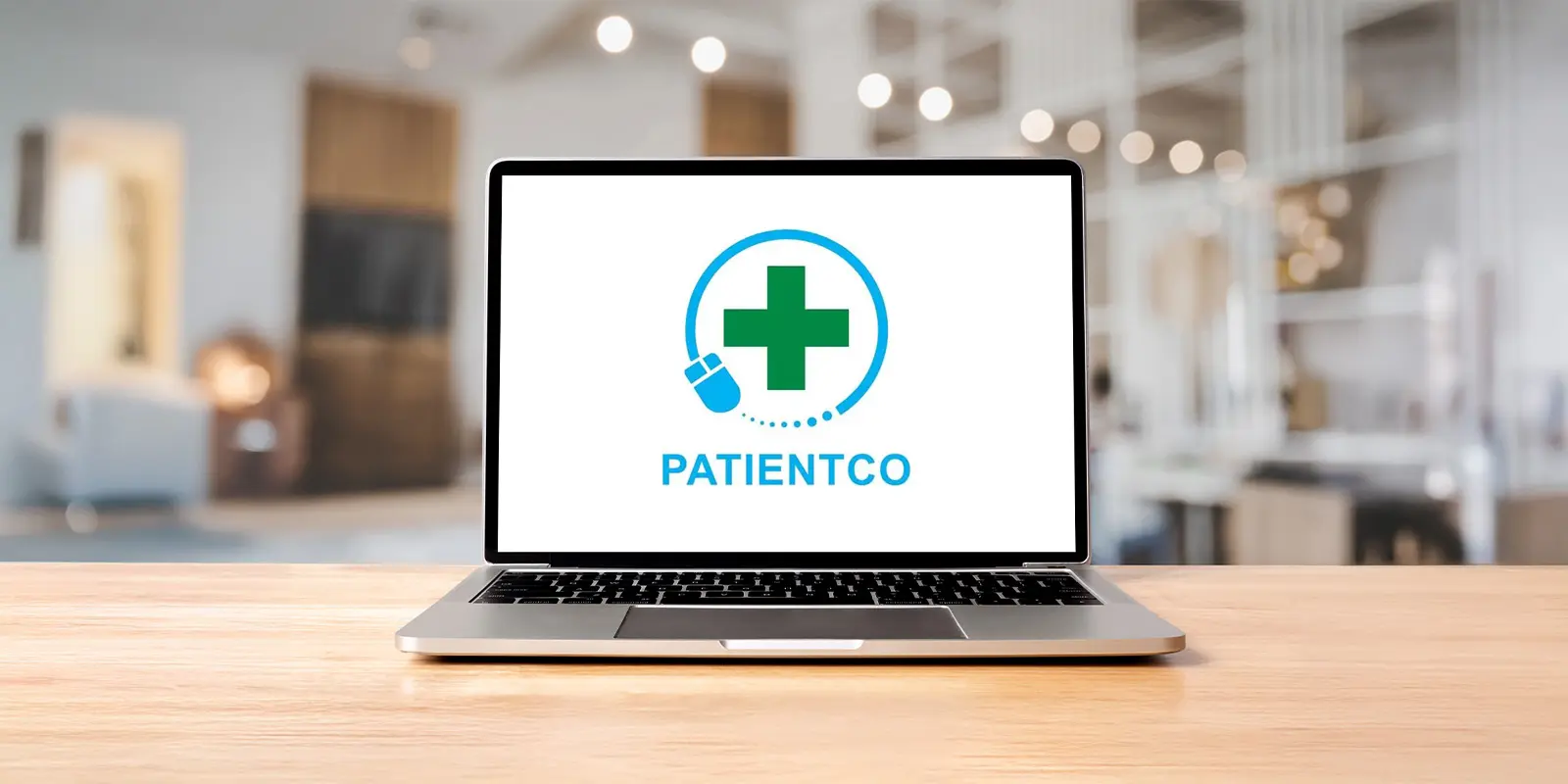 PatientCo logo on a laptop screen